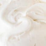 A close up photo of cream cheese buttercream.