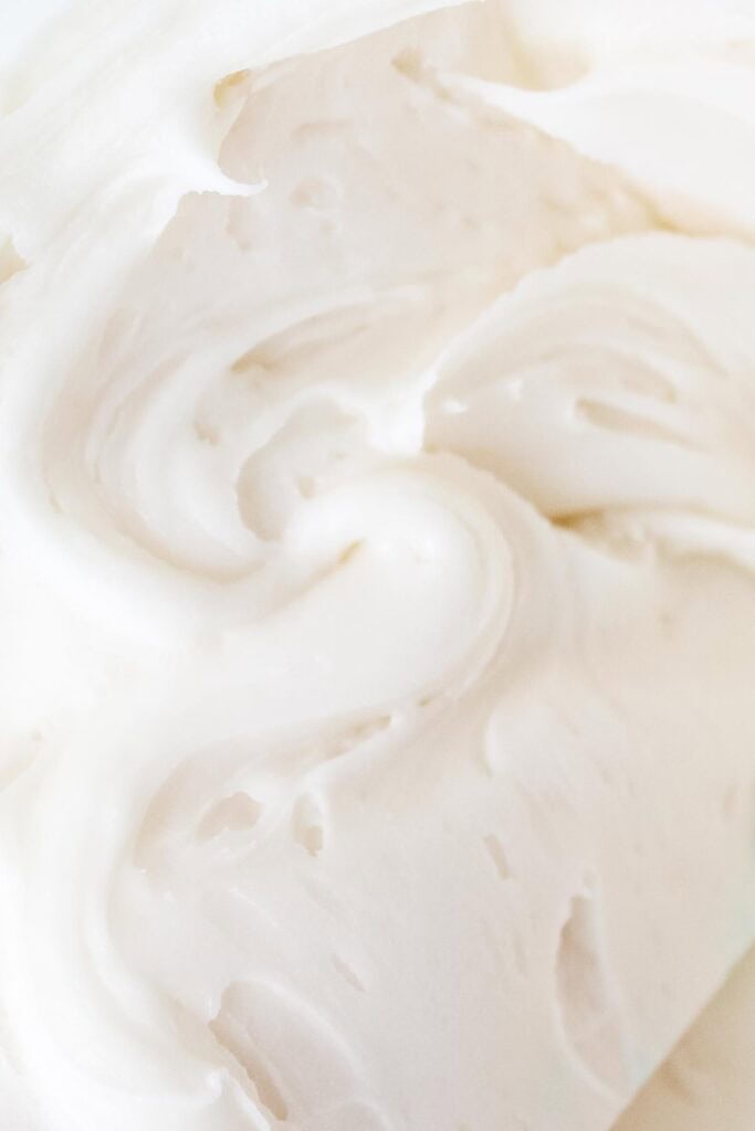 A close up photo of cream cheese buttercream.